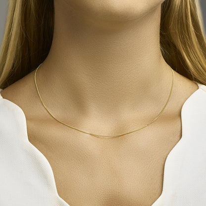 Gouden gourmette ketting 1,0 mm – 14 karaat – gedragen