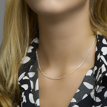 Zilveren gourmette ketting 1,8 mm, geslepen – close-up van de sluiting