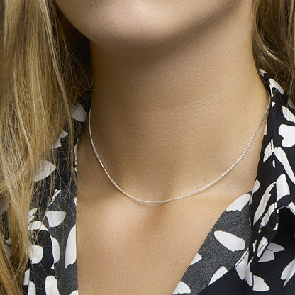 Zilveren geslepen gourmette ketting 1,4 mm – close-up van de sluiting