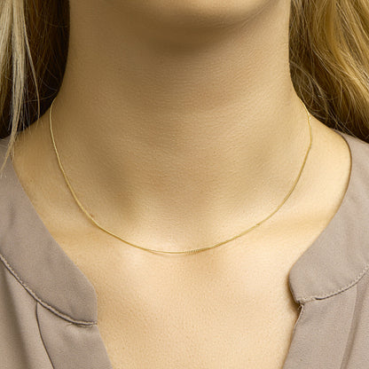 Gouden gourmette ketting 1,0 mm – 14 karaat – close-up van de sluiting