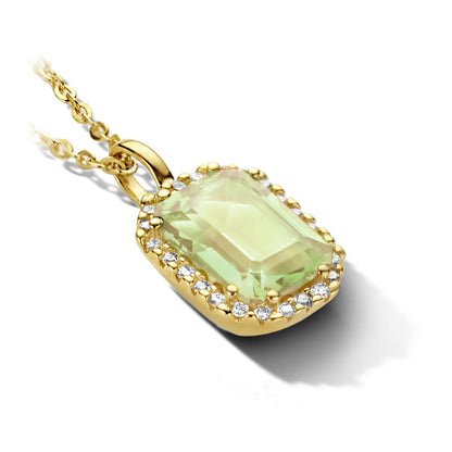 Gouden hanger met edelsteen en diamant – formaat vergeleken
