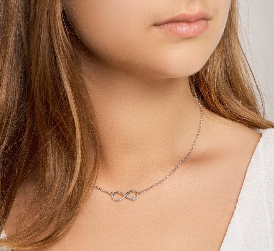 Zilveren ketting met infinity en hartje