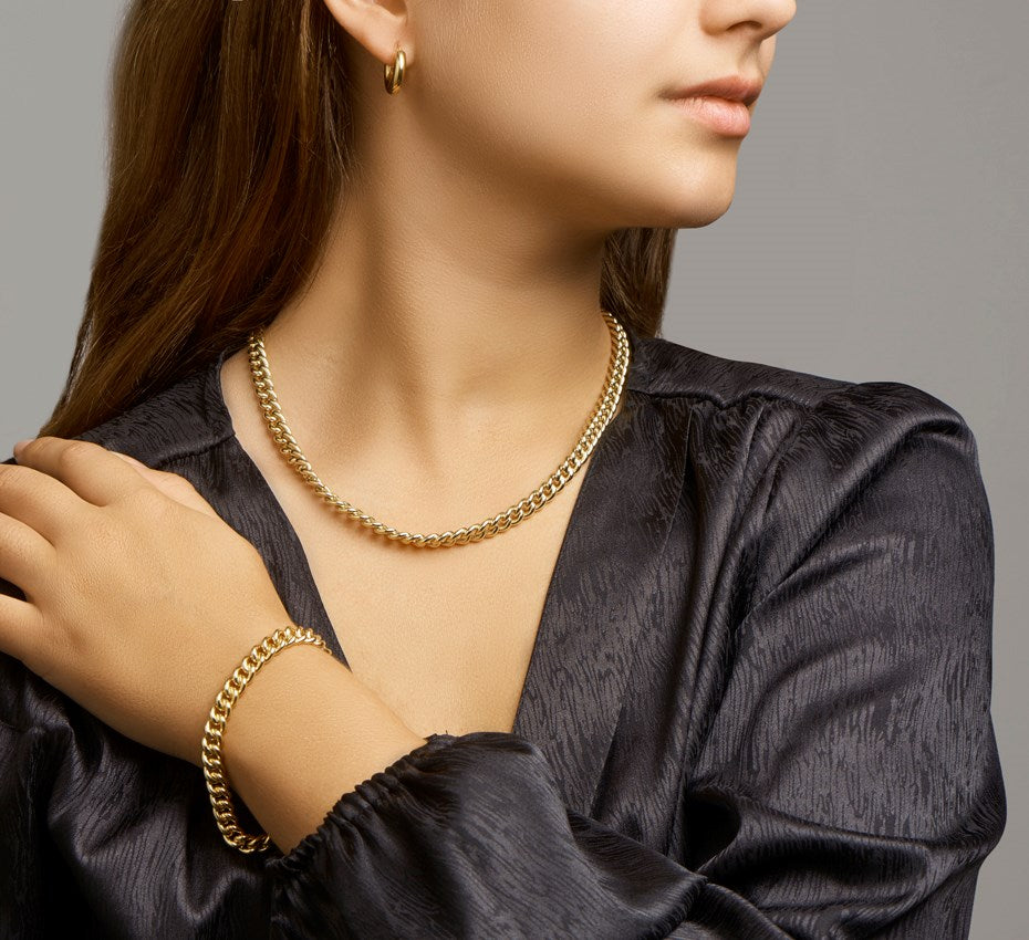 Zilveren gourmetteketting 7 mm met veerslot